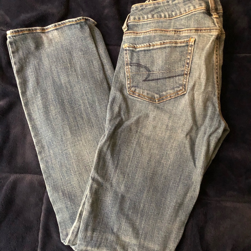 Medium wash distressed straight leg jeans